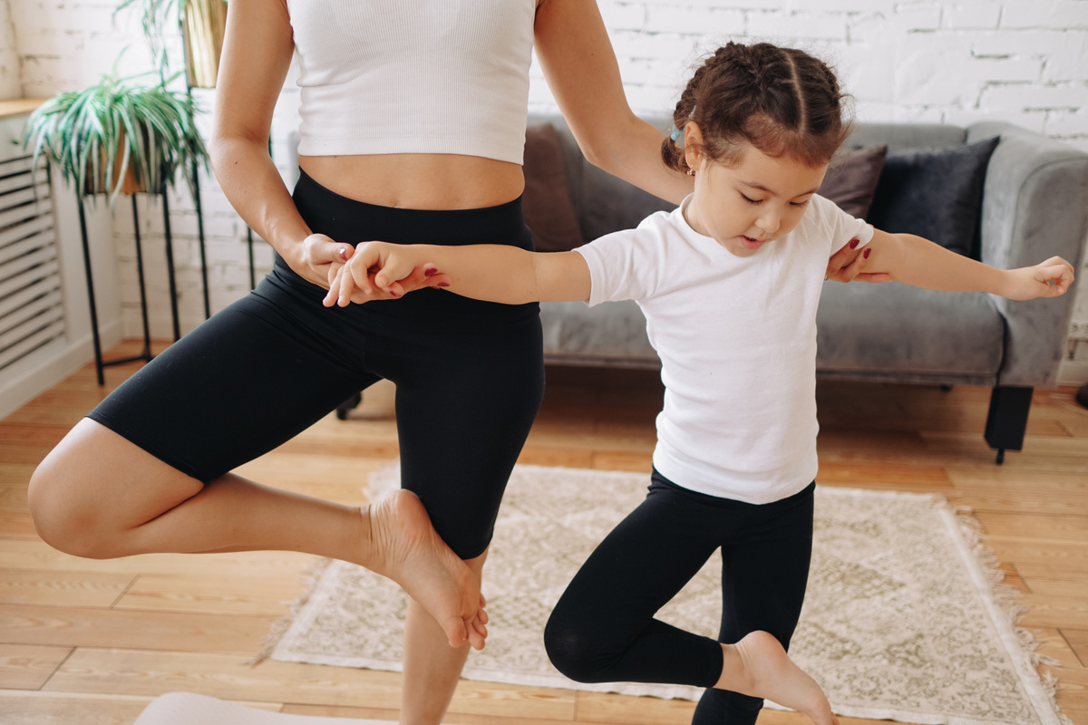 Mother and Child Doing Yoga